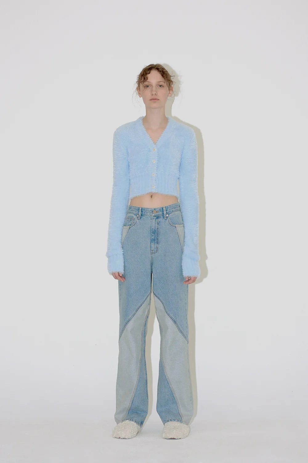 DIAGONAL SECTION DENIM PANTS IN BLUE