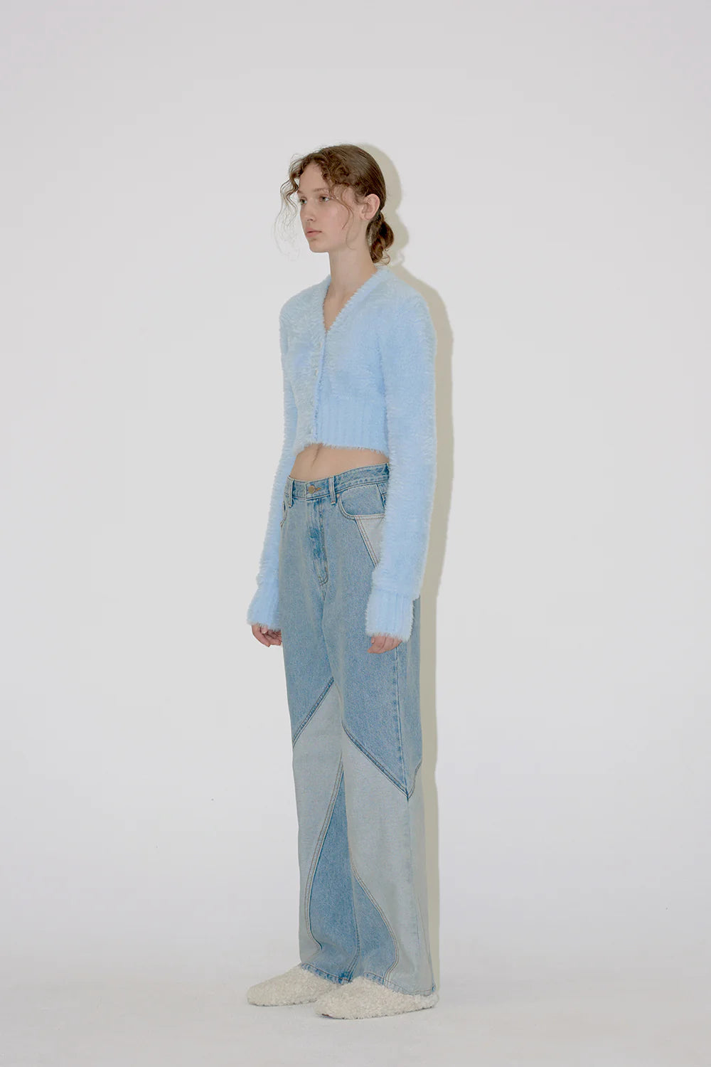 DIAGONAL SECTION DENIM PANTS IN BLUE